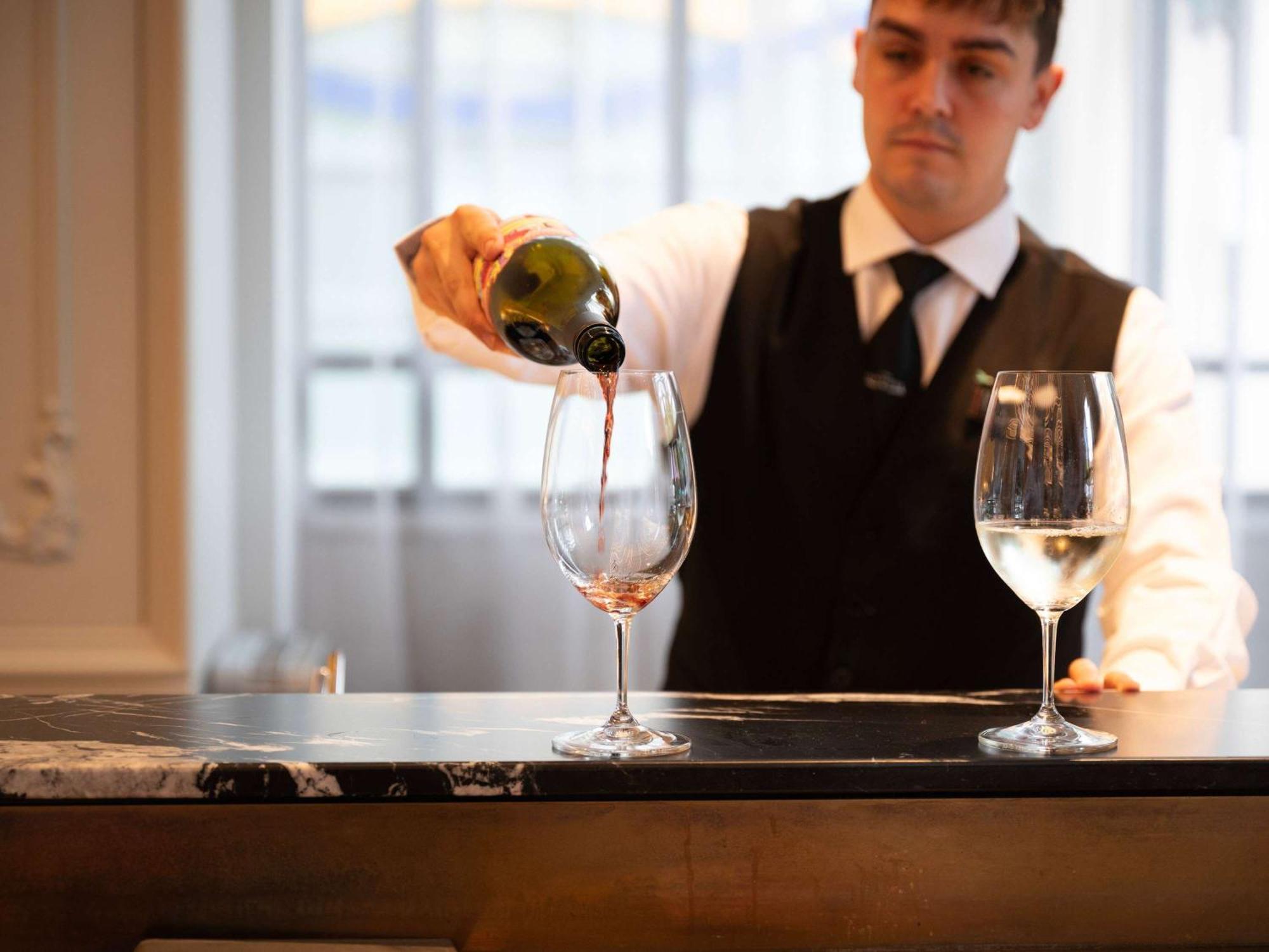 The Playford Adelaide - Mgallery Exteriér fotografie A sommelier pouring wine